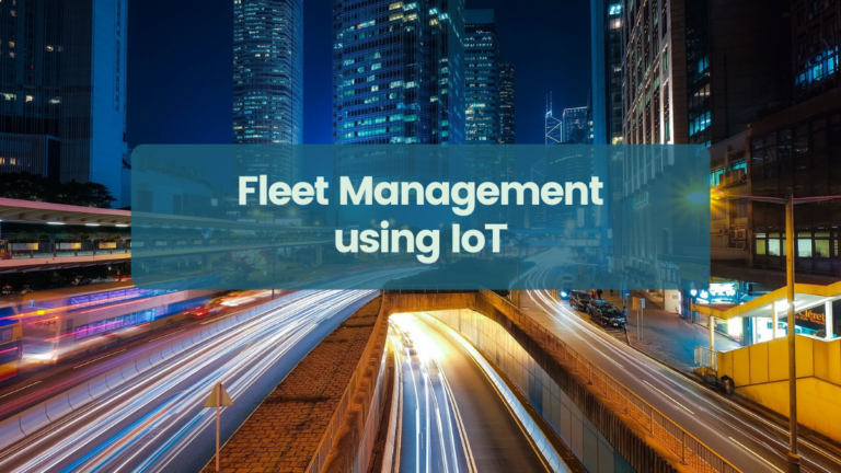 City lights in the background, banner reading Fleet Management Using IoT in the foreground