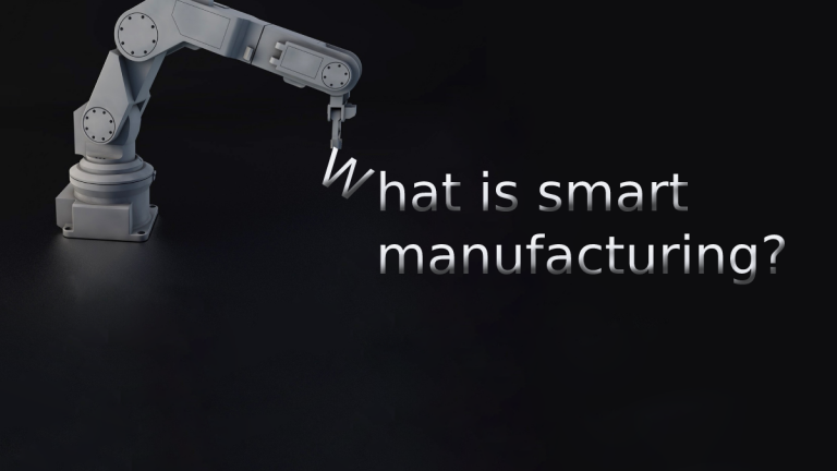 A robotic arm appears to be assembling a block of text that says "What is smart manufacturing?"